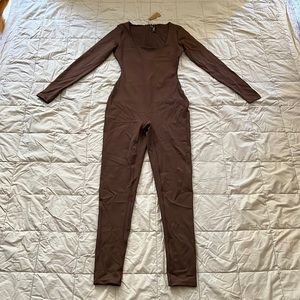 SKIMS ALL-IN-ONE SCOOP NECK LONG SLEEVE ONESIE
